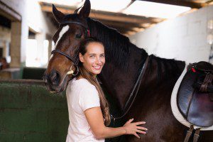 woman near horse - equine therapy